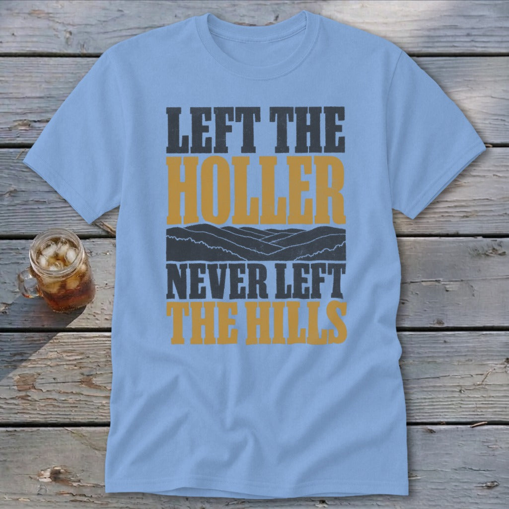 Light blue t-shirt with "LEFT THE HOLLER NEVER LEFT THE HILLS" text and mountain graphic.