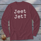 Maroon long-sleeve shirt with white text "Jeet Jet?".