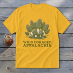 Yellow t-shirt with a morel mushroom illustration and "Wild Foraged Appalachia" text.