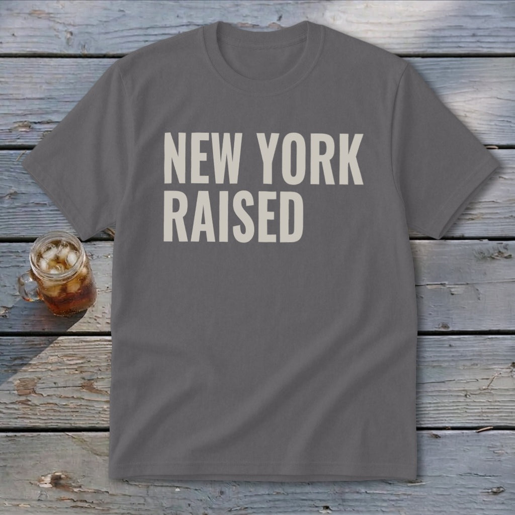 Gray t-shirt with "NEW YORK RAISED" text in cream.
