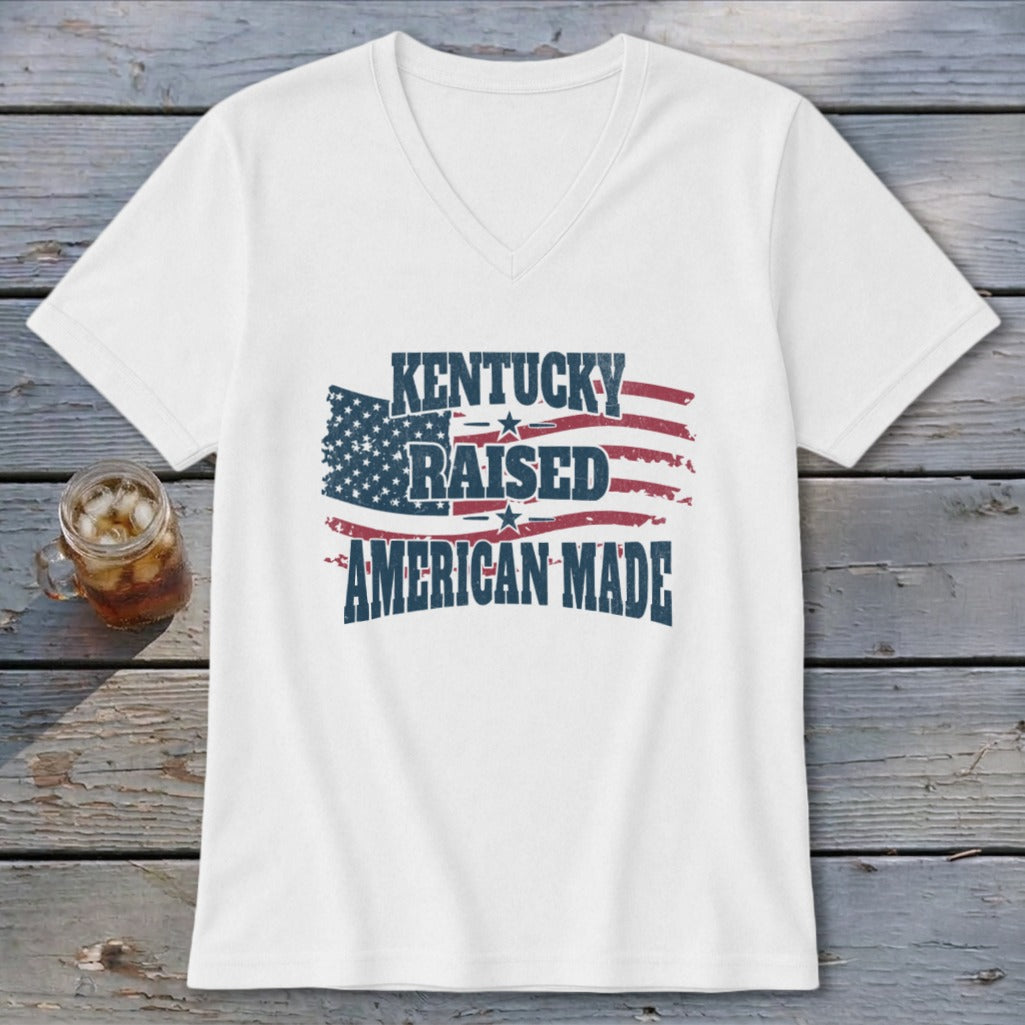 White v-neck t-shirt with distressed American flag graphic and text "Kentucky Raised American Made".