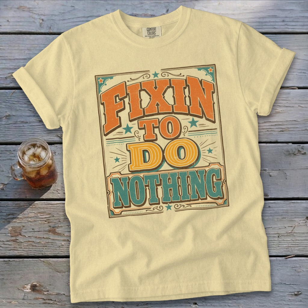 Cream t-shirt with "Fixin' to do nothing" text in vintage style.