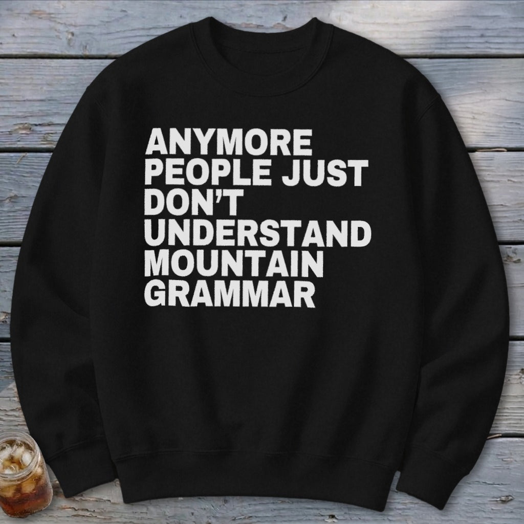 Black sweatshirt with white text reading "Anymore people just don't understand mountain grammar."