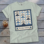 Light blue t-shirt with a quilt pattern and "Flying Geese" text.
