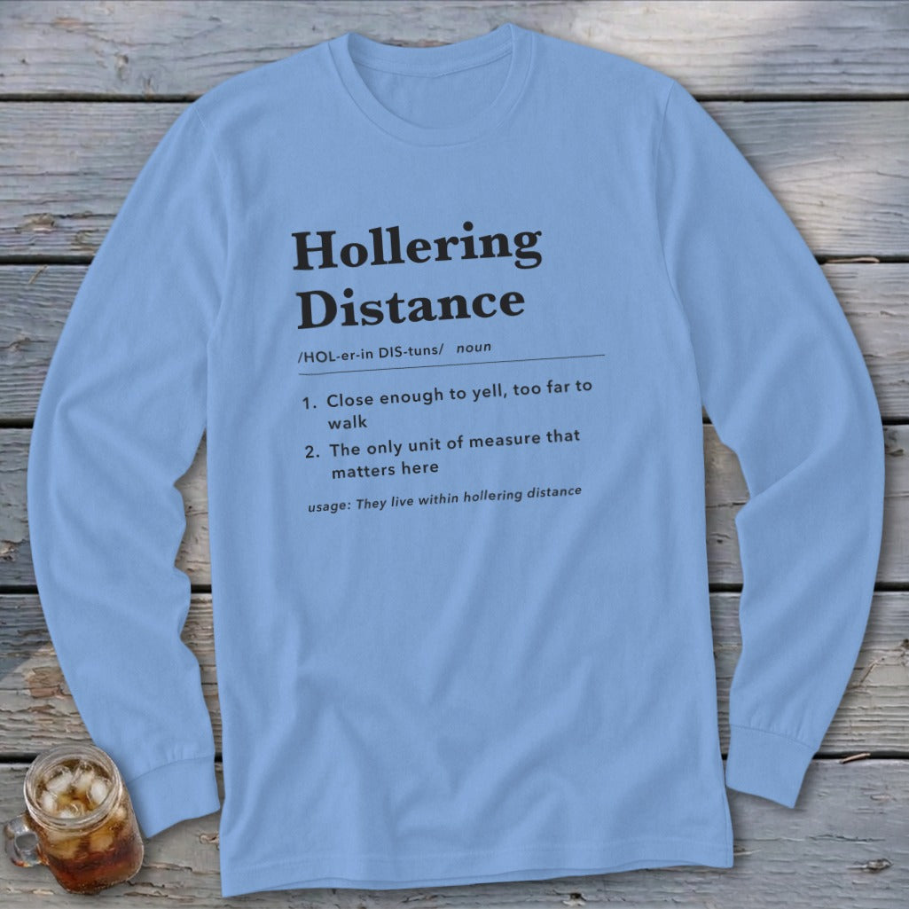Light blue long sleeve shirt with "Hollering Distance" definition printed on it.