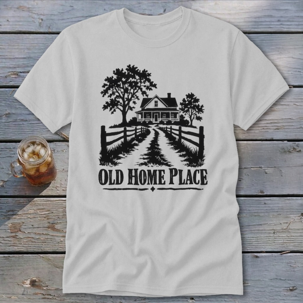 White t-shirt with black graphic of a house, trees, fence, and text "OLD HOME PLACE".