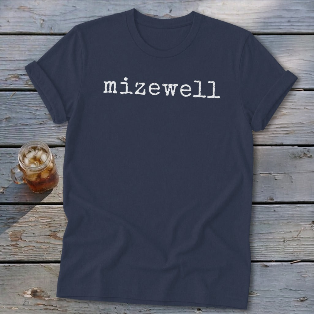 Navy t-shirt with white "mizewell" text and a glass of iced tea.