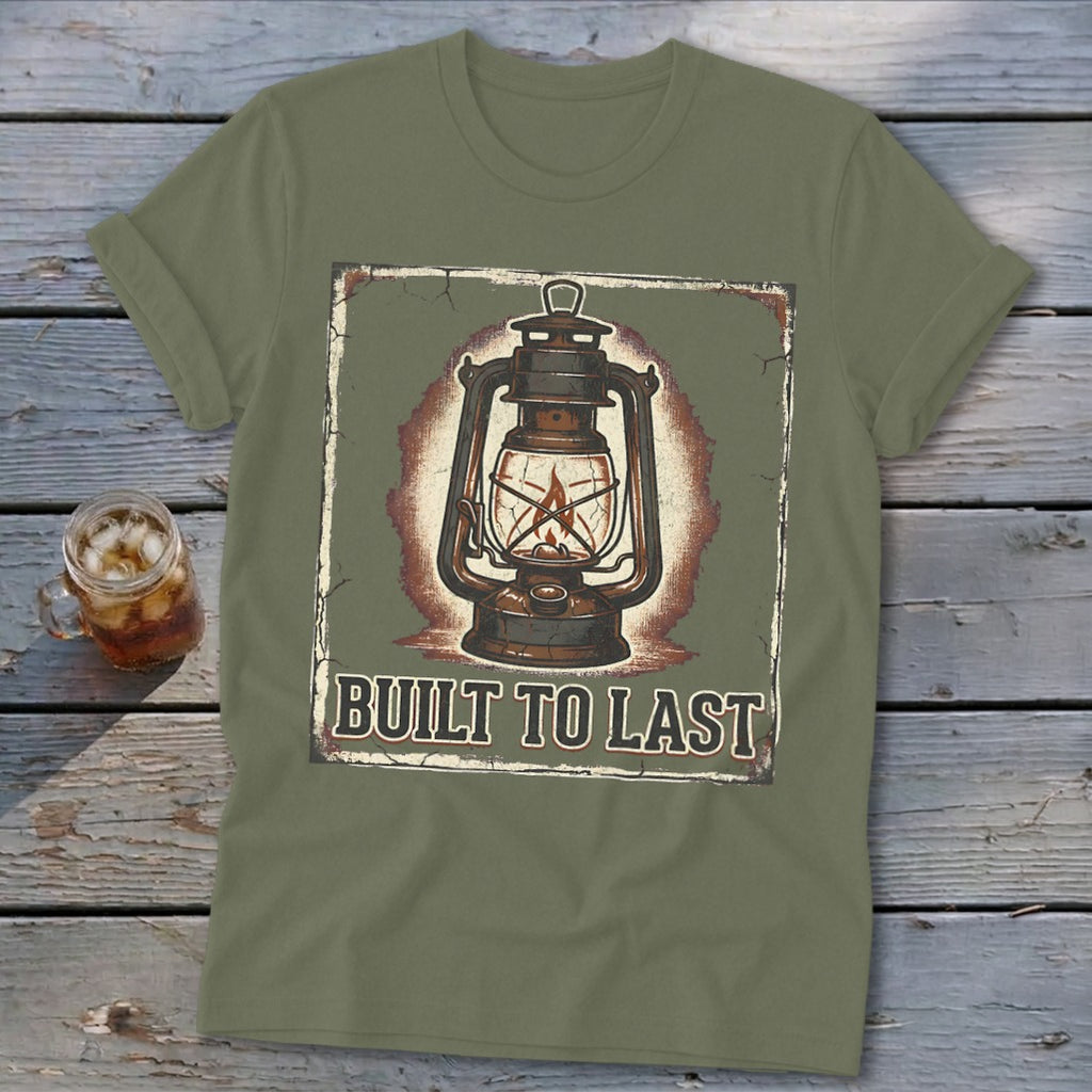 Green t-shirt with rustic lantern graphic and "Built to Last" text.