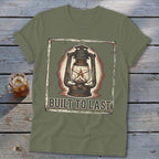 Green t-shirt with rustic lantern graphic and "Built to Last" text.