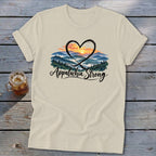 Cream t-shirt with "Appalachia Strong" text and a heart framing a mountain sunset scene.