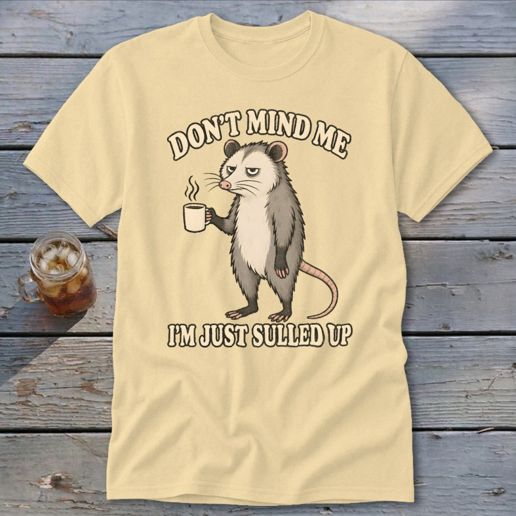 Opossum holding coffee mug with text "DON'T MIND ME I'M JUST SULLED UP".