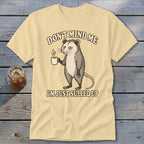 Opossum holding coffee mug with text "DON'T MIND ME I'M JUST SULLED UP".