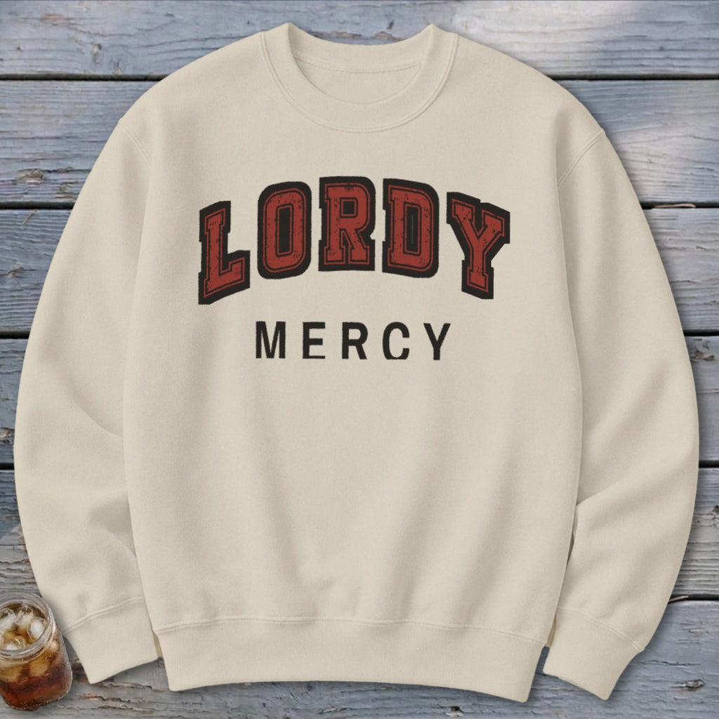 Cream sweatshirt with "LORDY MERCY" text in distressed red and black font.