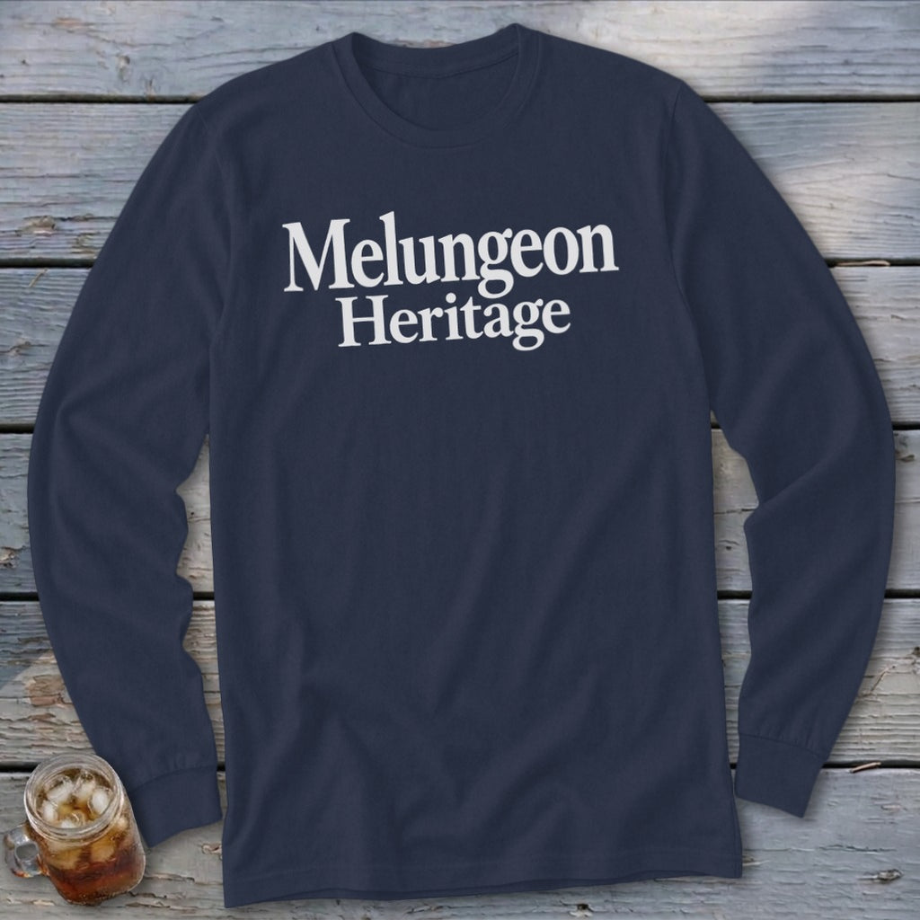 A dark blue long-sleeve shirt with white text reading "Melungeon Heritage" centered on the chest.