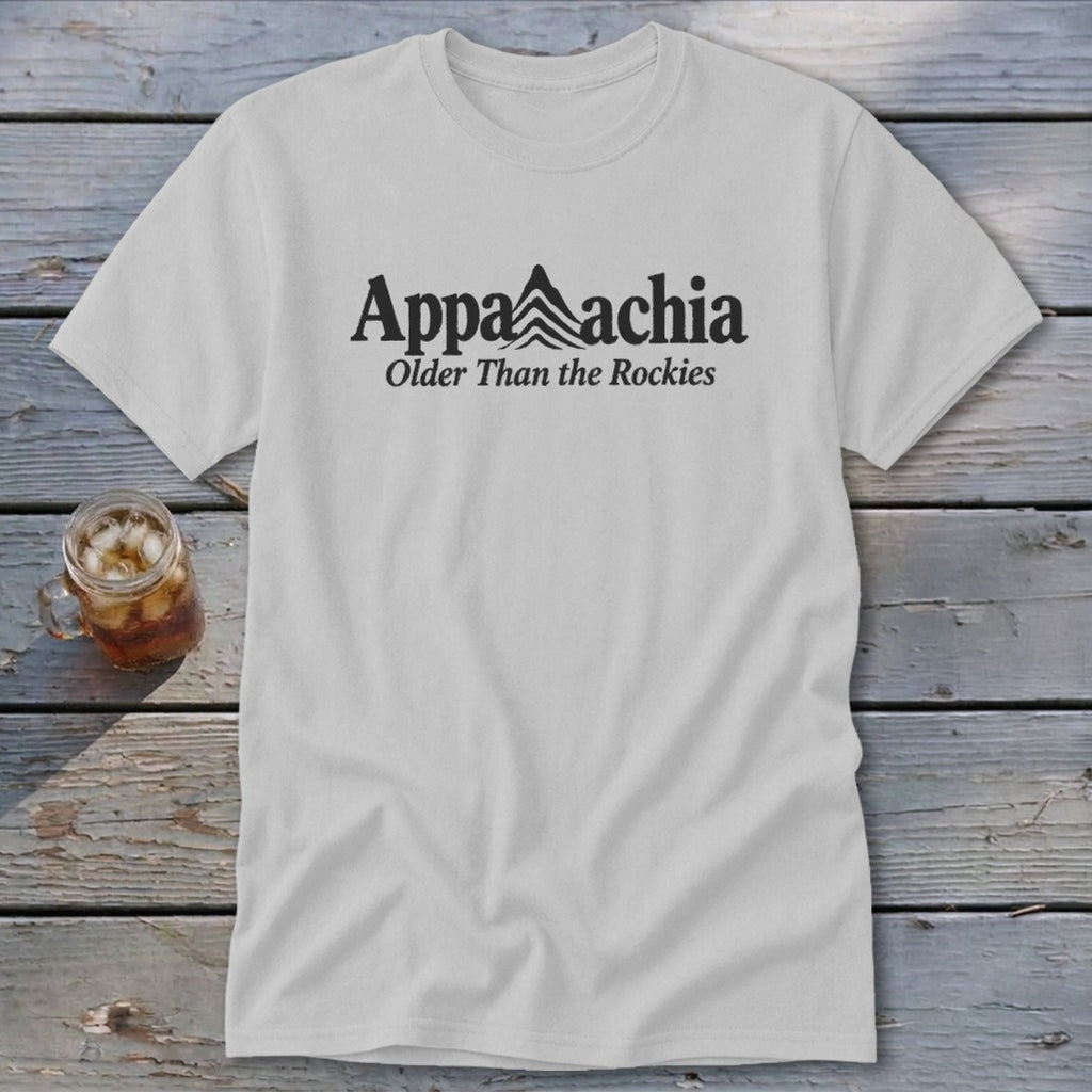 White t-shirt with black text "Appalachia Older Than the Rockies" and mountain graphic.