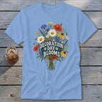 Light blue t-shirt with a floral bouquet graphic reading "Decoration Day Blooms."