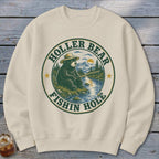 Cream sweatshirt with a circular graphic of a bear fishing, "Holler Bear Fishin' Hole" text.