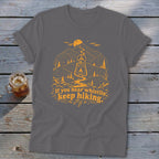 Gray t-shirt with orange hiking graphic and text "If you hear whistlin', keep hiking."