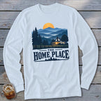 Long sleeve shirt with a sunset over mountains, a house, and "THE HOME PLACE" text.