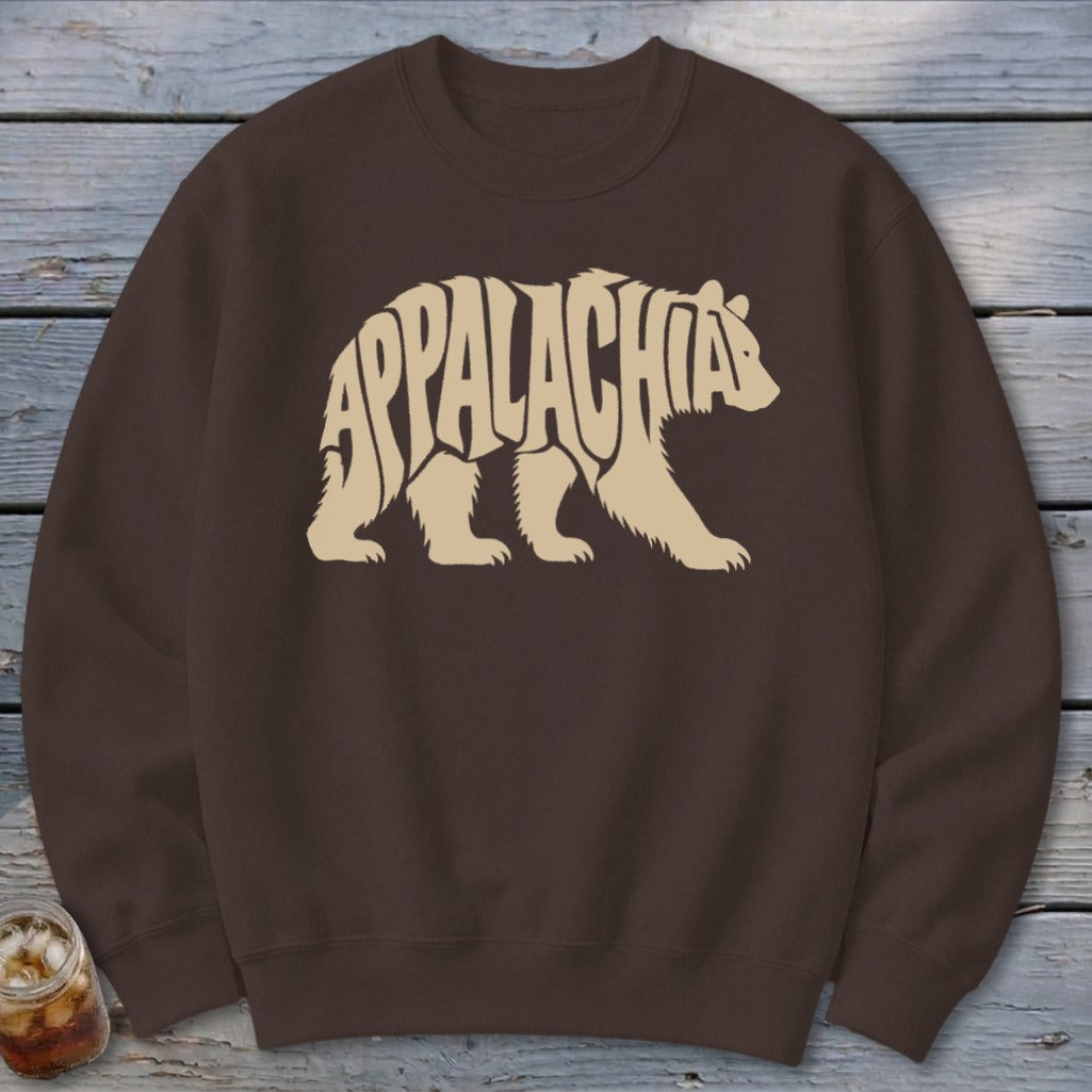 Brown crewneck sweatshirt featuring a cream graphic of a walking bear filled with the text Appalachia.