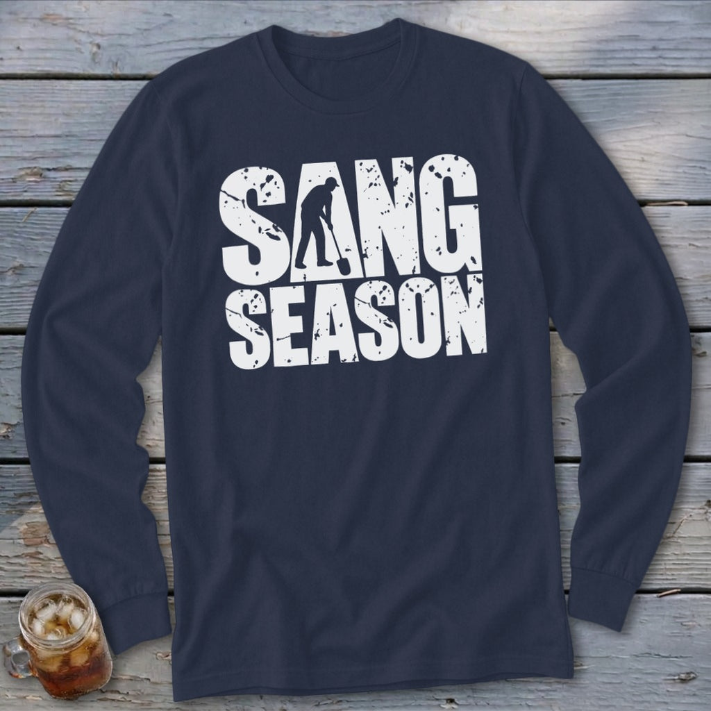 A navy blue long-sleeve t-shirt with white distressed text that reads SANG SEASON and a silhouetted digger.