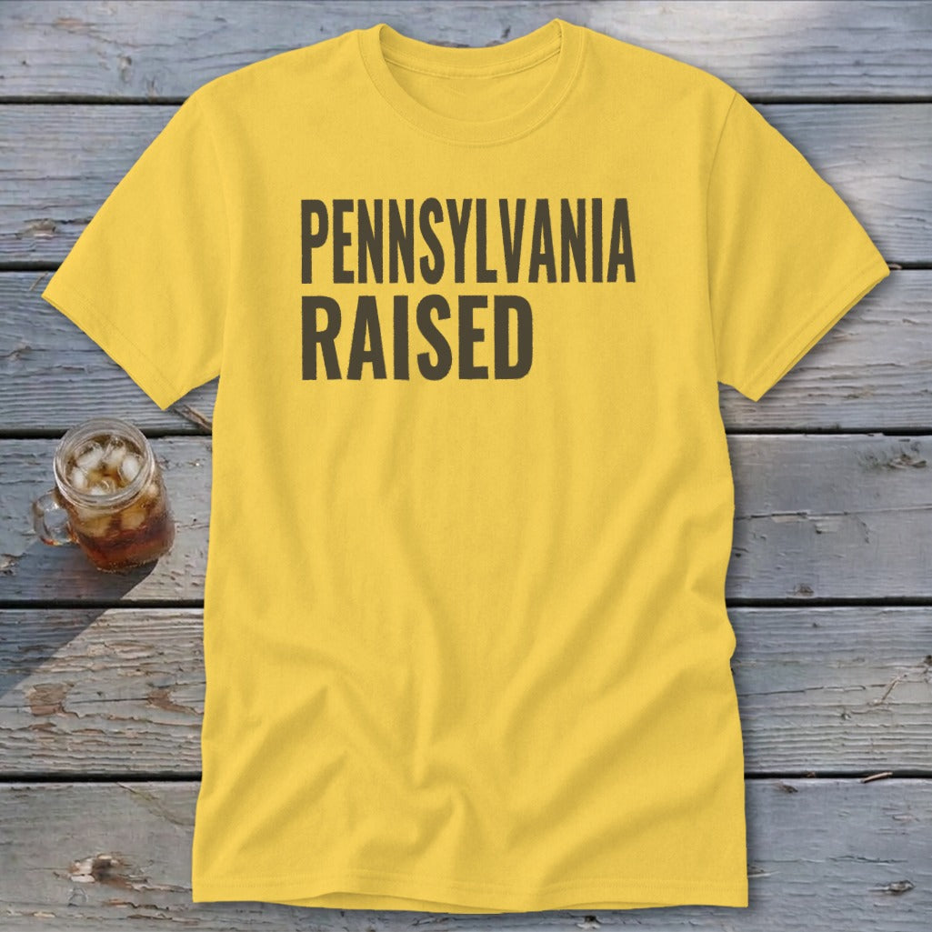 Yellow t-shirt with "PENNSYLVANIA RAISED" in black text.