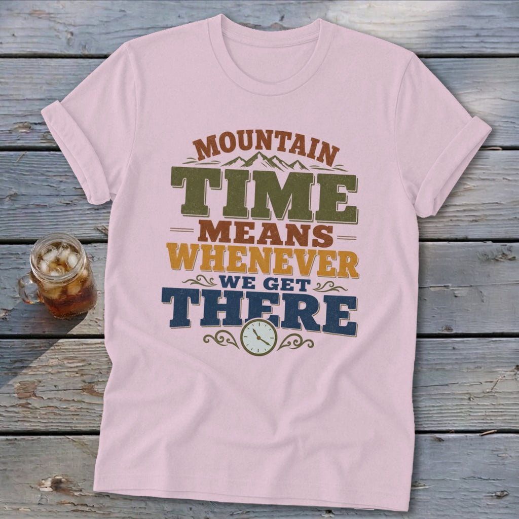 Pink t-shirt with text "MOUNTAIN TIME MEANS WHENEVER WE GET THERE".