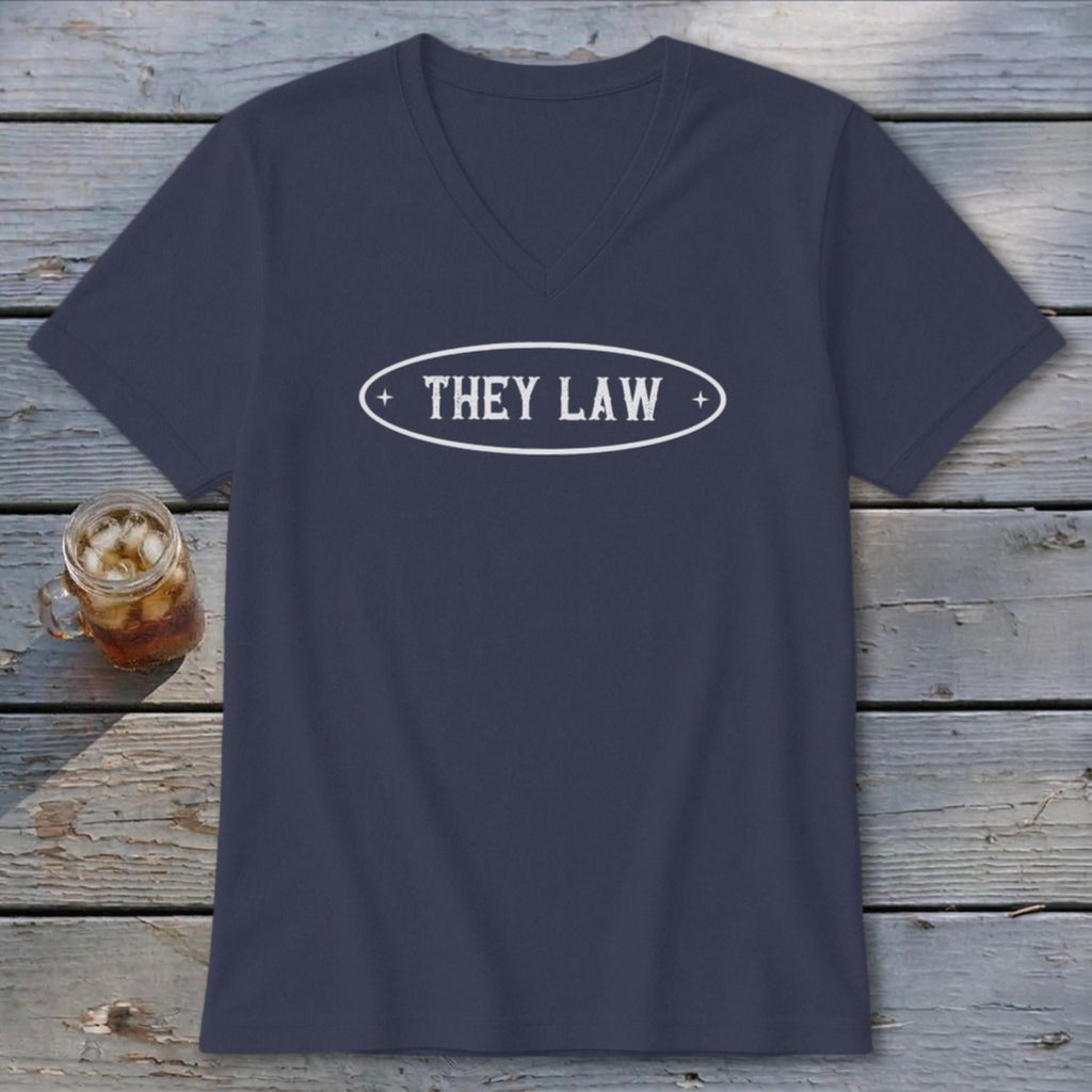 Navy V-neck t-shirt with white "THEY LAW" text in an oval graphic.