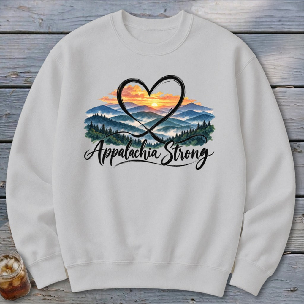 White sweatshirt with "Appalachia Strong" text over a mountain landscape and heart design.