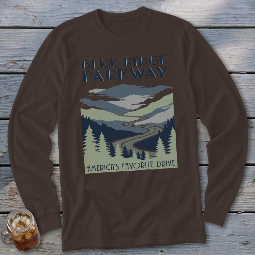 Brown long-sleeve t-shirt featuring a Blue Ridge Parkway graphic with mountains, winding road, and pine trees.
