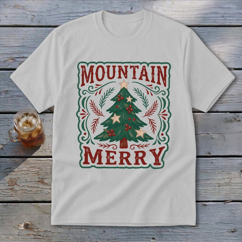 Light gray t-shirt featuring a green Christmas tree graphic and the text Mountain Merry.