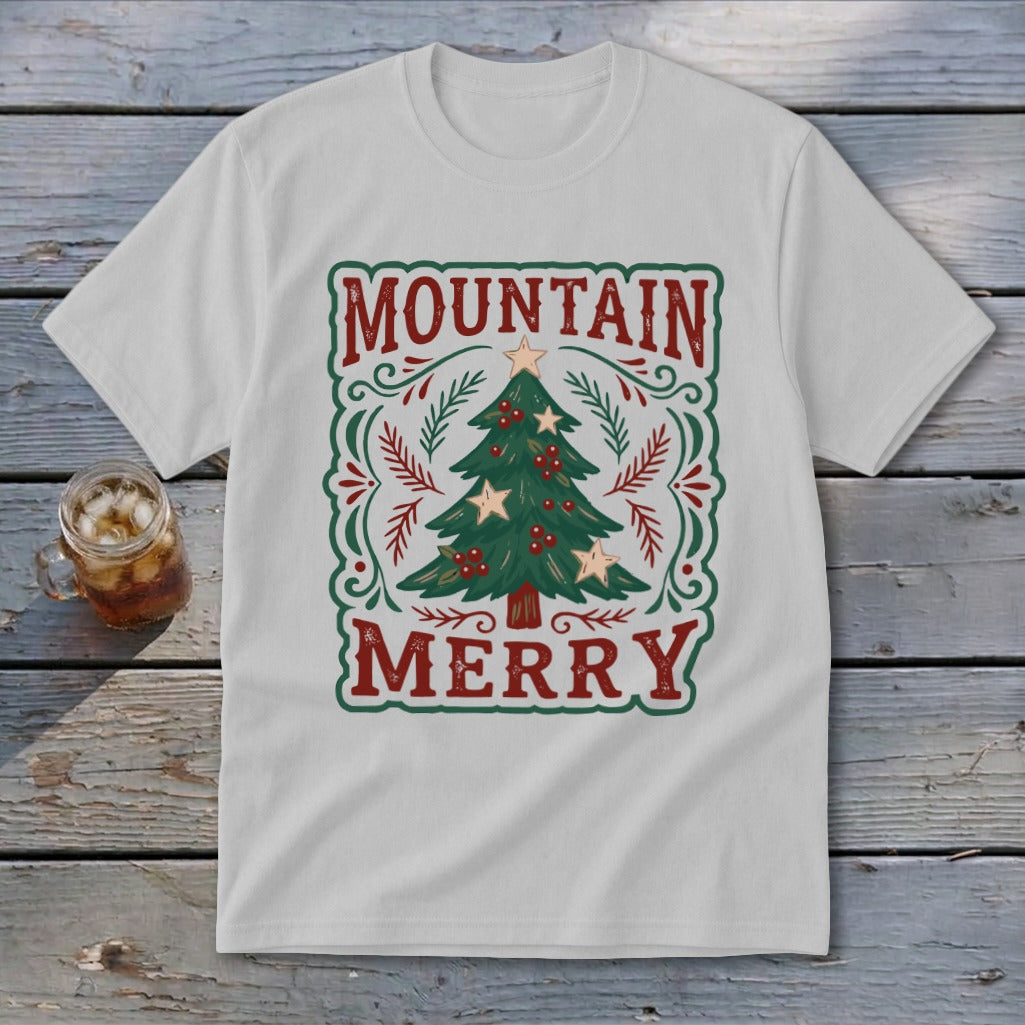 Light gray t-shirt featuring a green Christmas tree graphic and the text Mountain Merry.