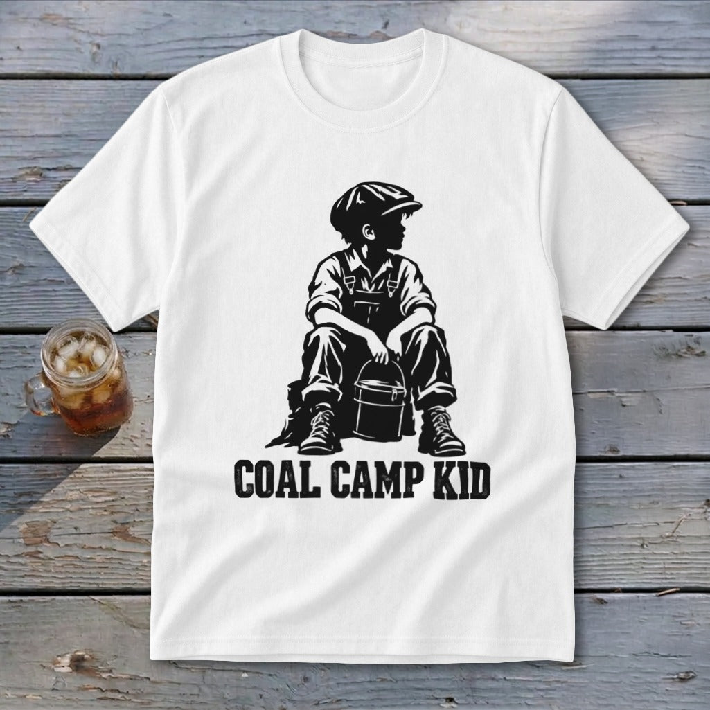 White t-shirt with black graphic of a boy in overalls holding a bucket, text reads "COAL CAMP KID".