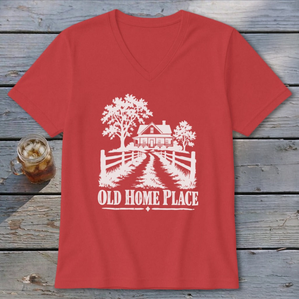 Red t-shirt with white graphic of a house, trees, fence, and text "OLD HOME PLACE".