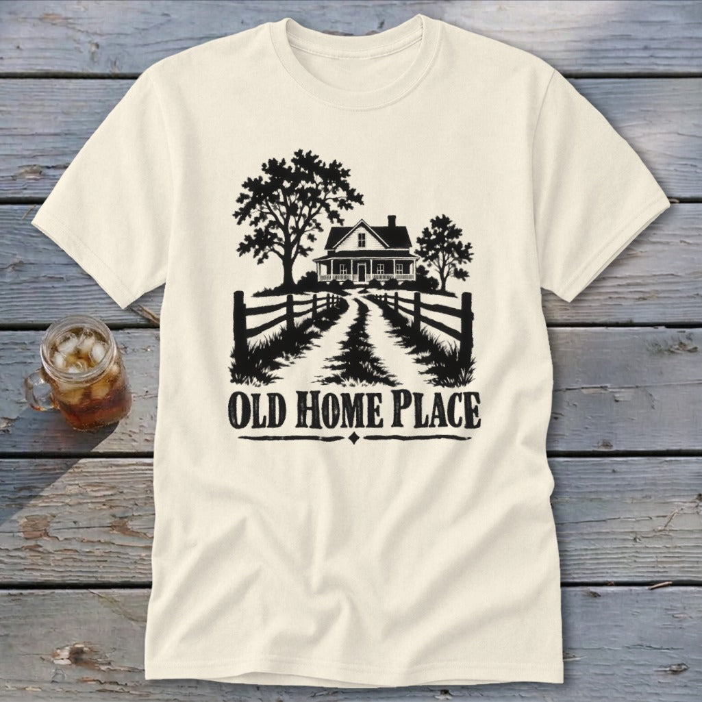 Cream t-shirt with black graphic of a farmhouse, trees, and text "OLD HOME PLACE".