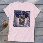 T-shirt with a dark blue design of fireflies in a jar under a starry night sky.