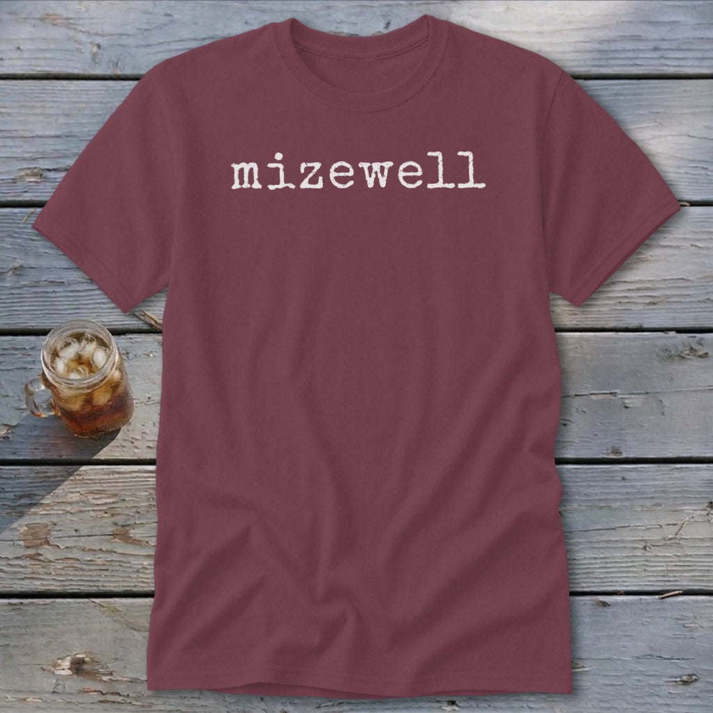 Maroon t-shirt with "mizewell" printed in white distressed font.