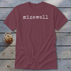 Maroon t-shirt with "mizewell" printed in white distressed font.