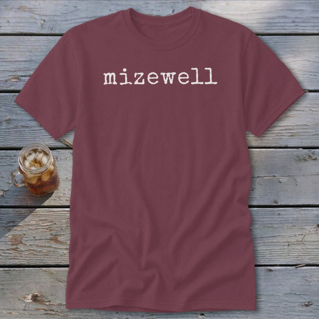 Maroon t-shirt with "mizewell" printed in white distressed font.