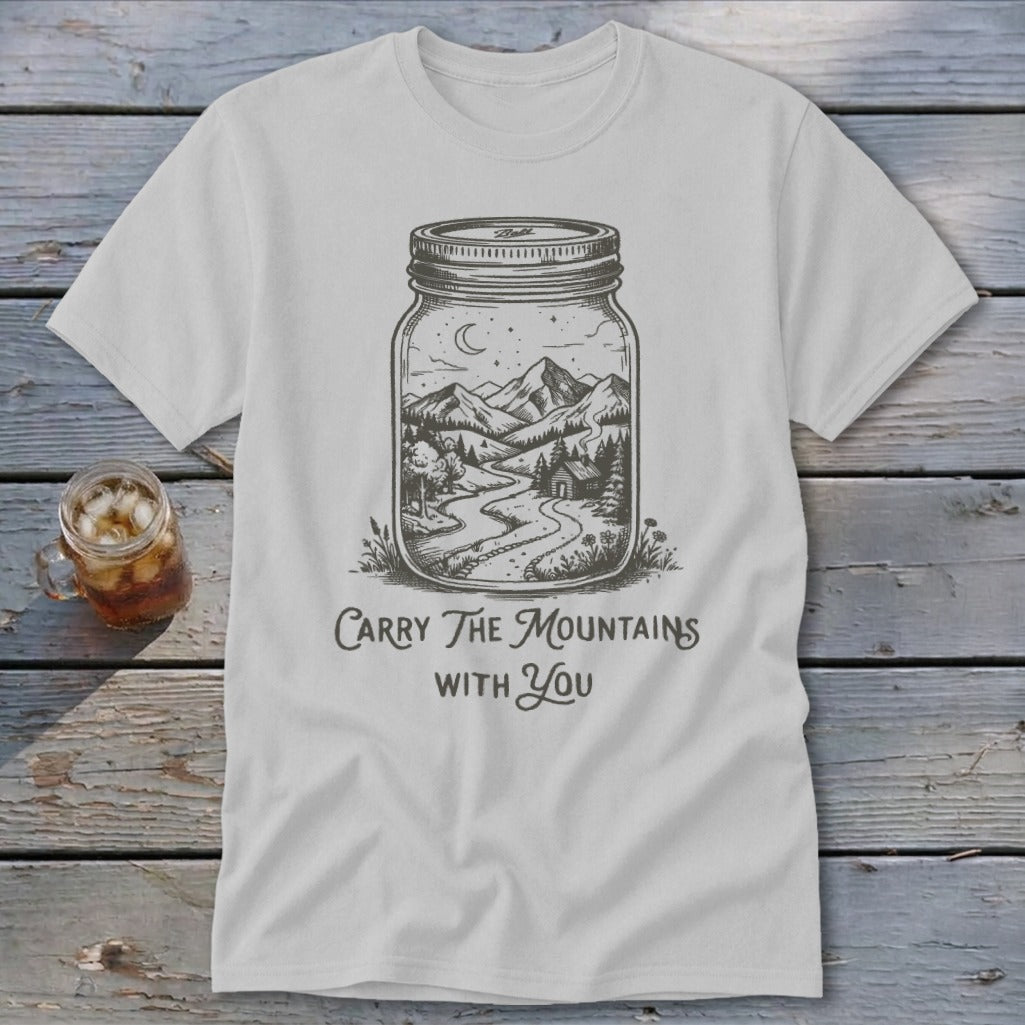 Light gray t-shirt featuring a mason jar graphic of a mountain landscape and text reading Carry The Mountains With You.