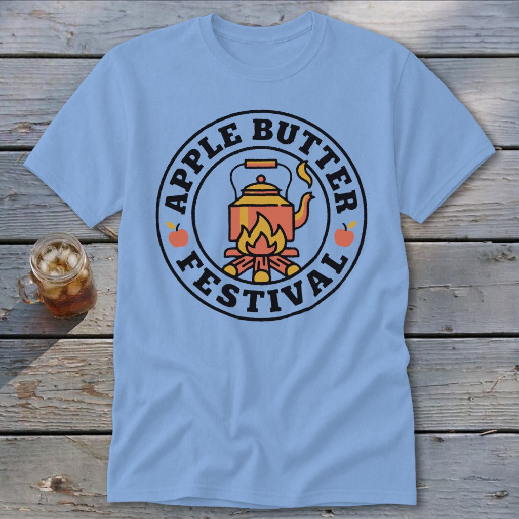 Light blue t-shirt with circular "Apple Butter Festival" logo featuring a kettle over a campfire.