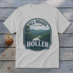 White t-shirt with "All Roads Lead to the Holler" graphic featuring a winding road through mountains.