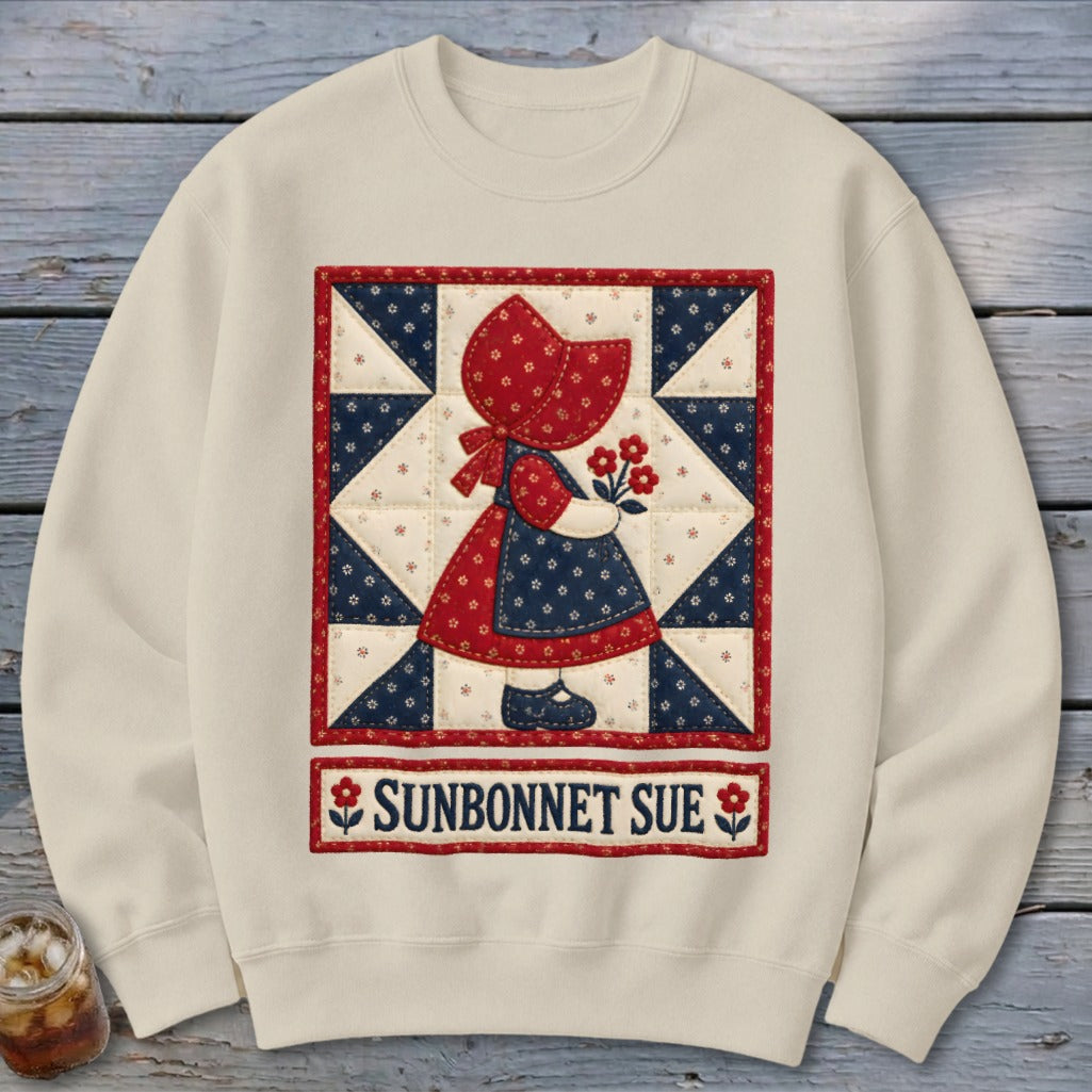 Cream sweatshirt with Sunbonnet Sue applique and text.