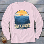 Light pink long-sleeve t-shirt featuring a retro mountain landscape graphic with the text Over Yonder.