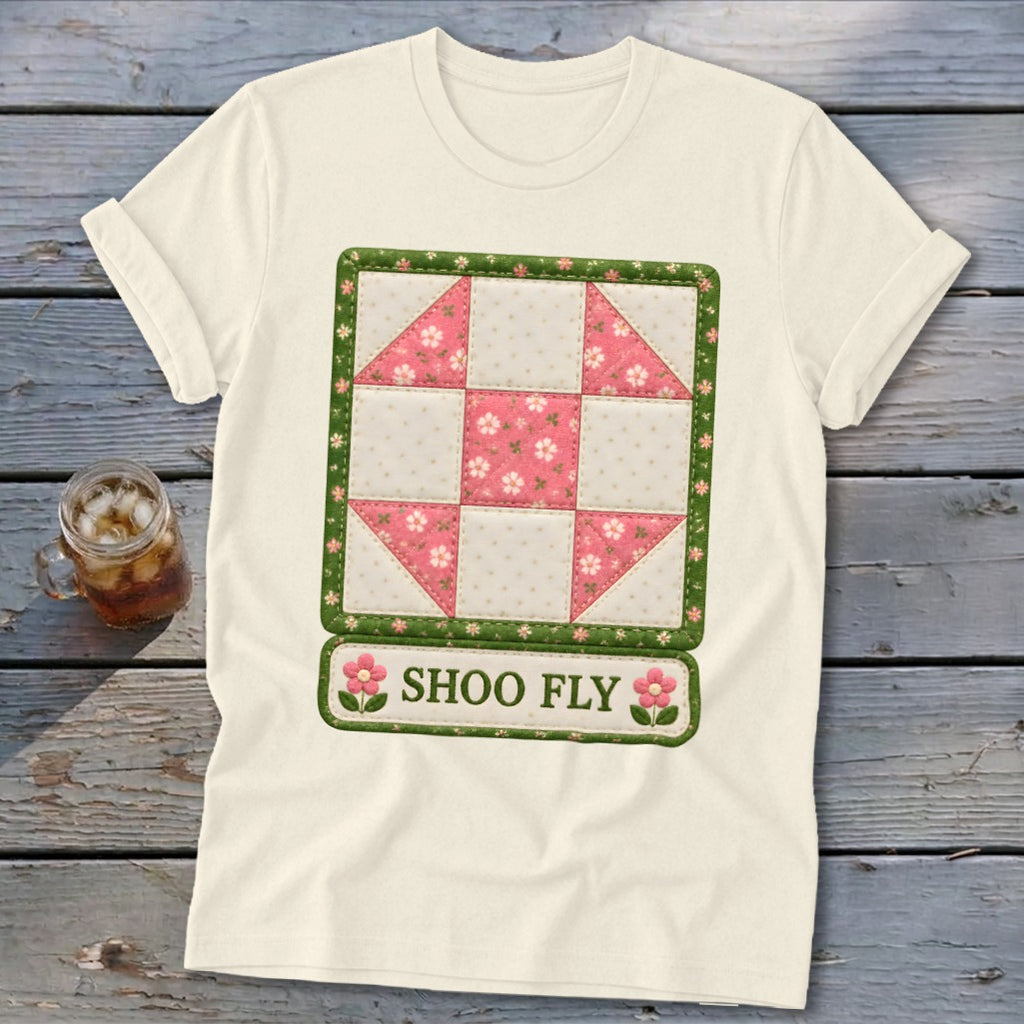 Cream t-shirt with Shoo Fly quilt block design and text.