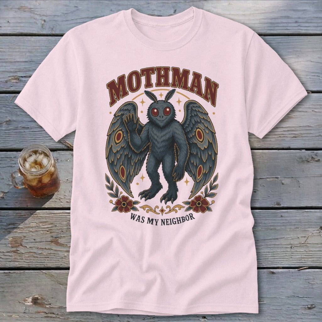 Pink t-shirt with Mothman artwork: "MOTHMAN WAS MY NEIGHBOR".
