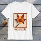 White t-shirt with a quilted maple leaf design and "Maple Leaf" text.