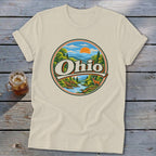 Cream t-shirt with circular Ohio graphic featuring deer and scenic landscape.
