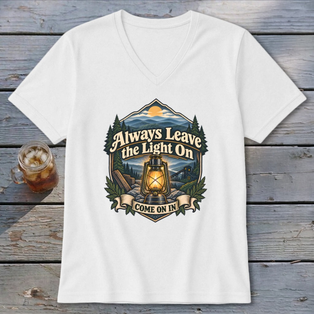 White v-neck t-shirt with a nature graphic featuring a lantern and text.