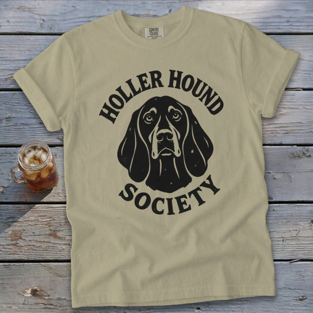 Tan t-shirt with black Holler Hound Society dog graphic and text.